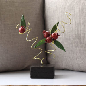 Table top handcrafted ornament Pomegranate. Symbol of plently, youth, good luck and fertility. The famous red fruit in Greek mythology.